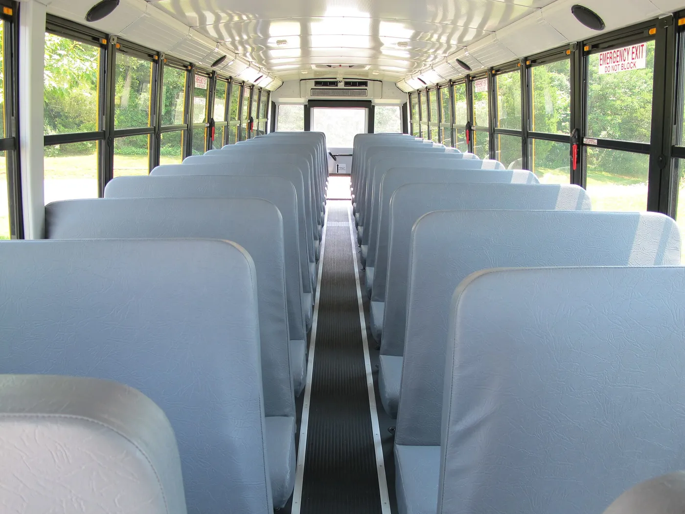 Empty rows of seats inside a school bus